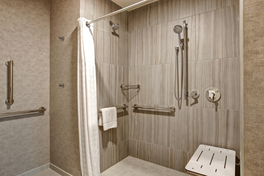 King One-Bedroom Suite Mobility Accessible Roll-in Shower